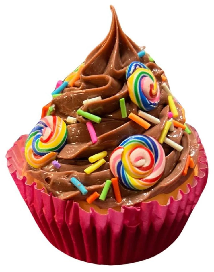 Christmas ornaments shaped like cupcakes with different colored frosting and candies on them.
