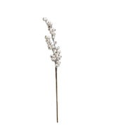 Pick spray designed to look like white berries on a brown stem.