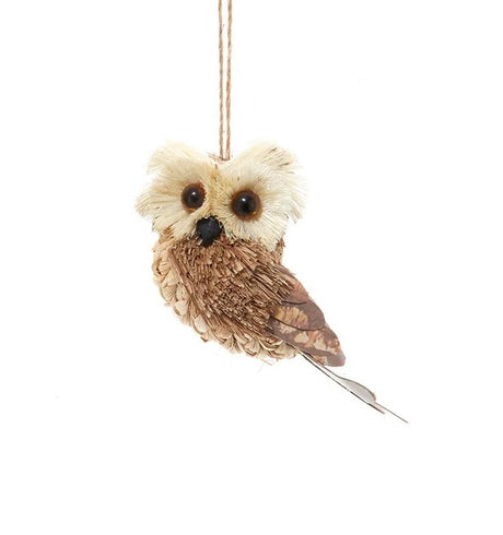 Ornament shaped like an owl with big, brown eyes.