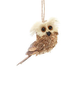 Ornament shaped like an owl with big, brown eyes.