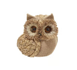 Ornament shaped like an owl with big, brown eyes.