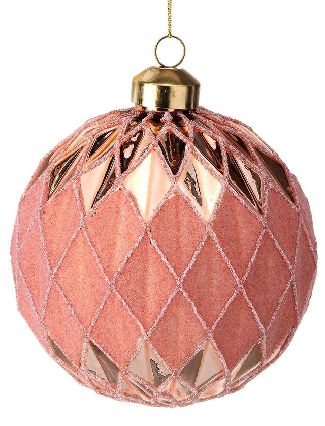 Round bauble ornament. Features a unique textured design. Different hues of the color pink.