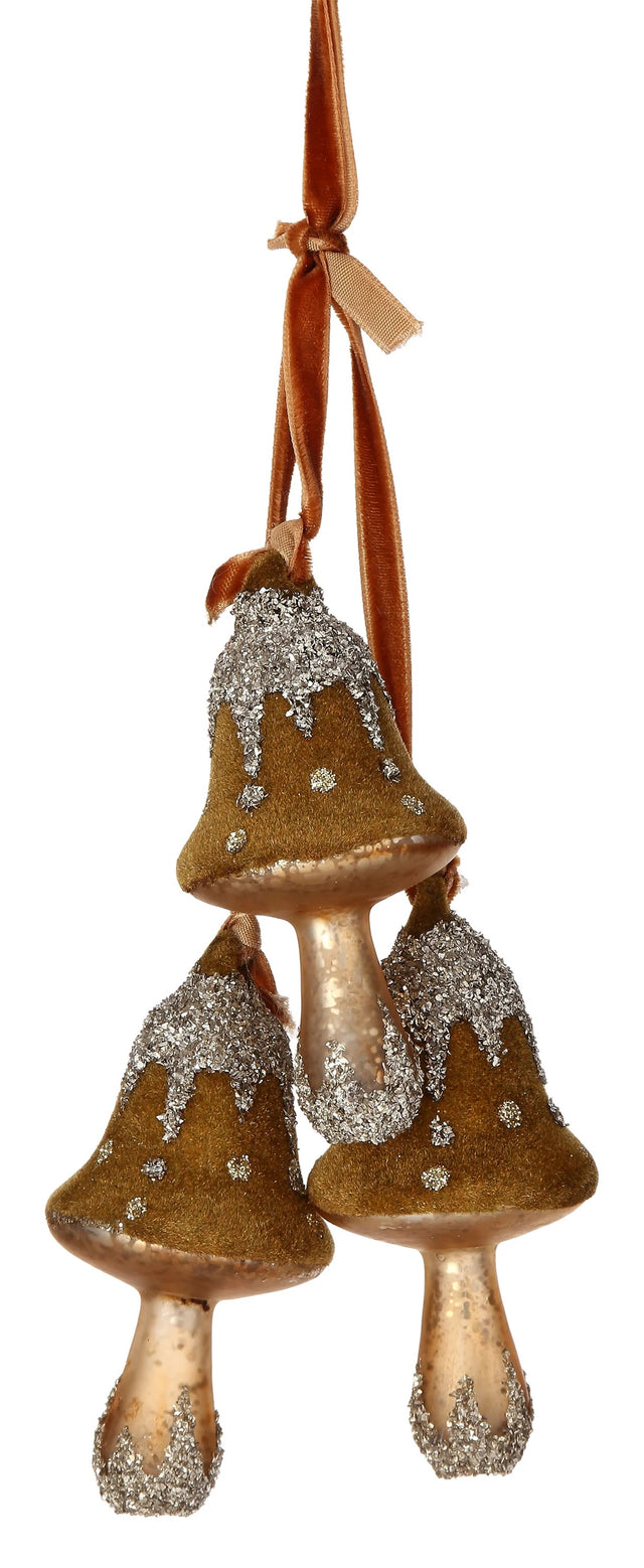 Ornament consisting of three mushrooms. The colors are aged moss, gold and silver.