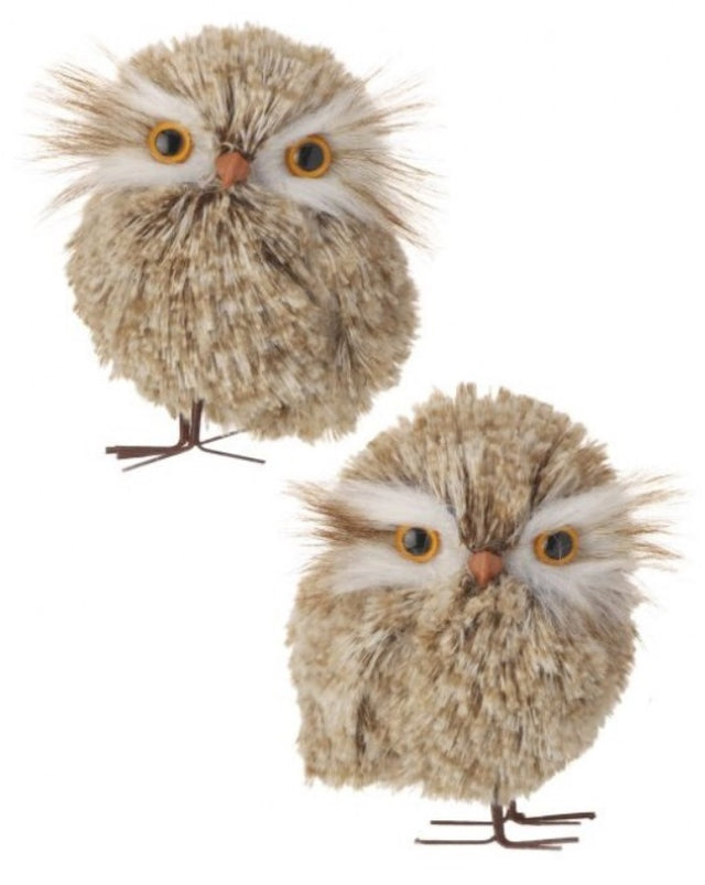 Fluffy ornament shaped like a cute owl with big, yellow/orange eyes.