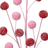 Pink stem with red and pink glitter-covered pompoms