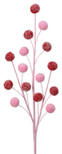 Pink stem with red and pink glitter-covered pompoms