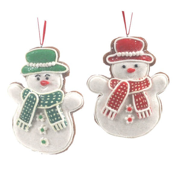 Christmas ornament designed to look like a gingerbread cookie shaped like a snowman. One snowman is wearing a green top hat and a green scarf. One snowman is wearing a red top hat and a red scarf.