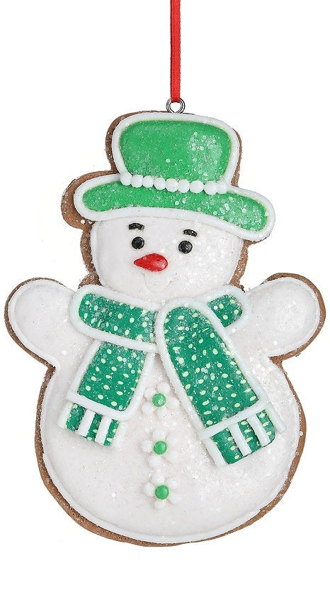 Christmas ornament designed to look like a gingerbread cookie shaped like a snowman. One snowman is wearing a green top hat and a green scarf. One snowman is wearing a red top hat and a red scarf.