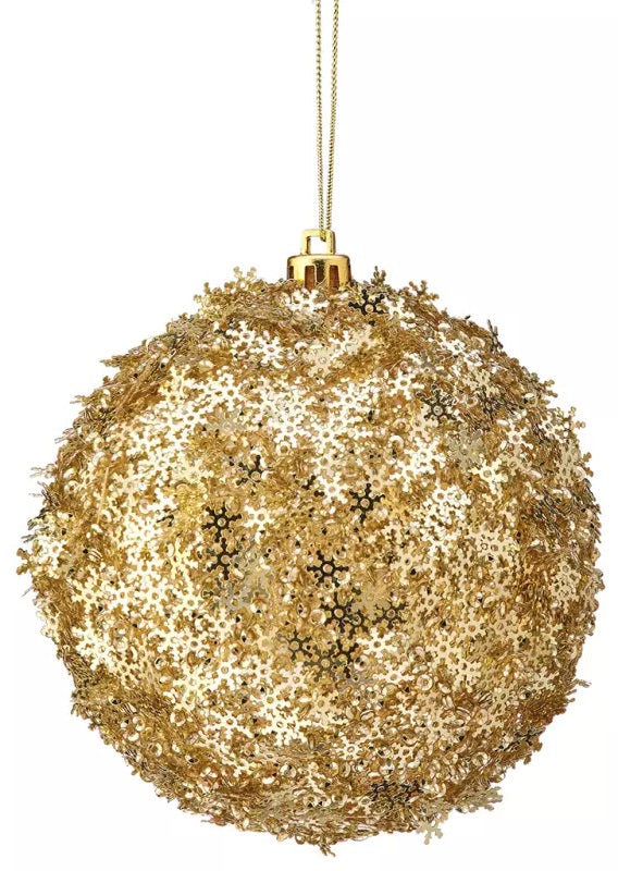 Ball ornament covered in gold snowflake shaped sequins.