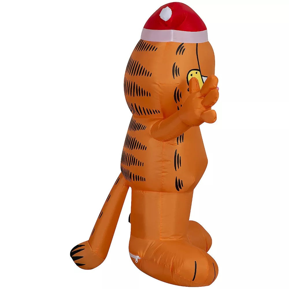 Christmas inflatable designed to look like the cartoon character Garfield wearing a Santa hat.
