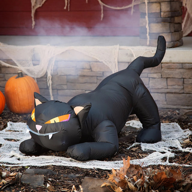 Halloween inflatable shaped like a black cat ready to pounce.