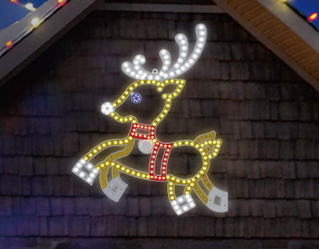 Outdoor LED decoration shaped like a reindeer. The lights make it look like it's prancing