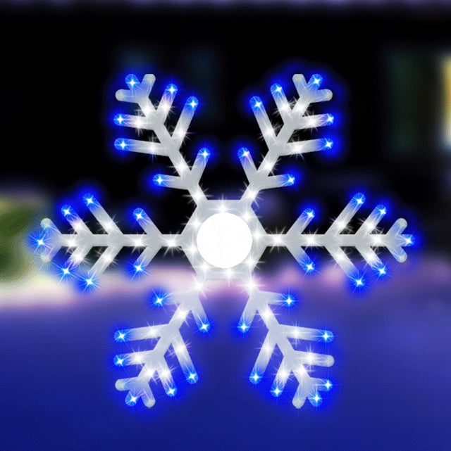 Outdoor LED decoration shaped like a snowflake. It's lit with blue and pure white lights.