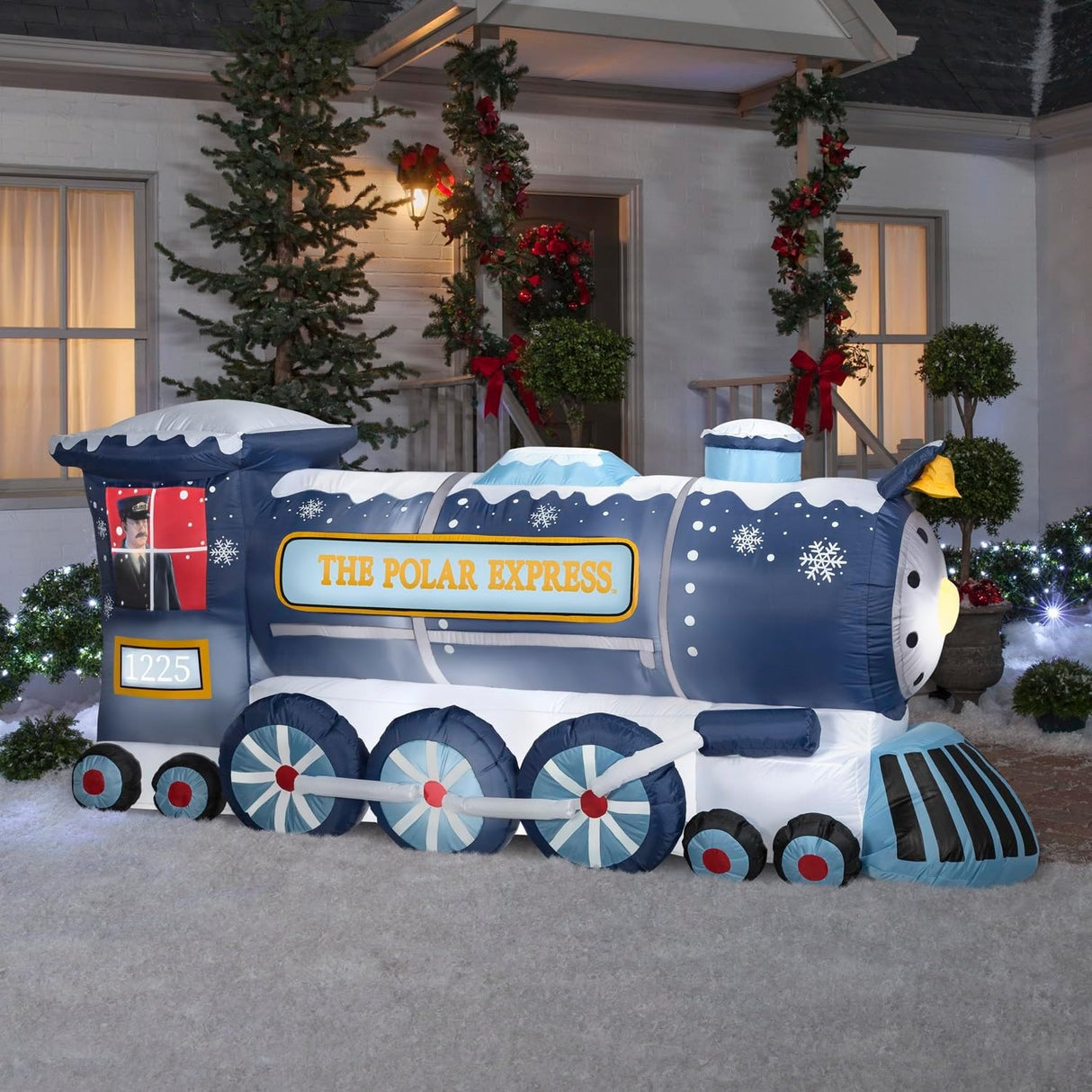 Christmas inflatable shaped like a blue train from the movie The Polar Express. Featuring the classic conductor peering through the window.