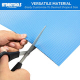This image shows someone using scissors to cut the mat. It reads "HydroTools by Swimline. Versatile material. Easily customize to desired shape and size."