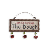 Decorative hanging sign with jingle bells underneath. One sign reads "Dashing Through the Dough." One sign reads "Merry Christmas." One sign reads "Snowmen Melt Your Heart."