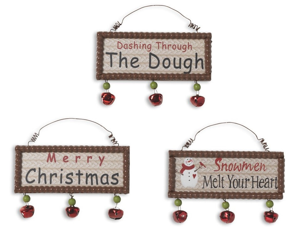 Decorative hanging sign with jingle bells underneath. One sign reads "Dashing Through the Dough." One sign reads "Merry Christmas." One sign reads "Snowmen Melt Your Heart."