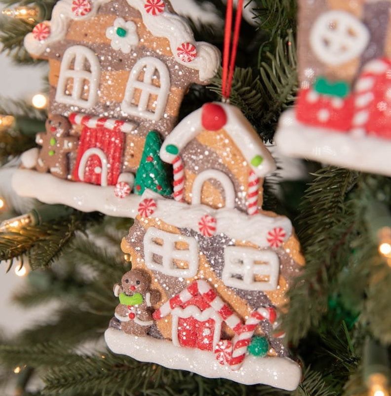 This is a lifestyle image showing the three different ornament options on a tree.