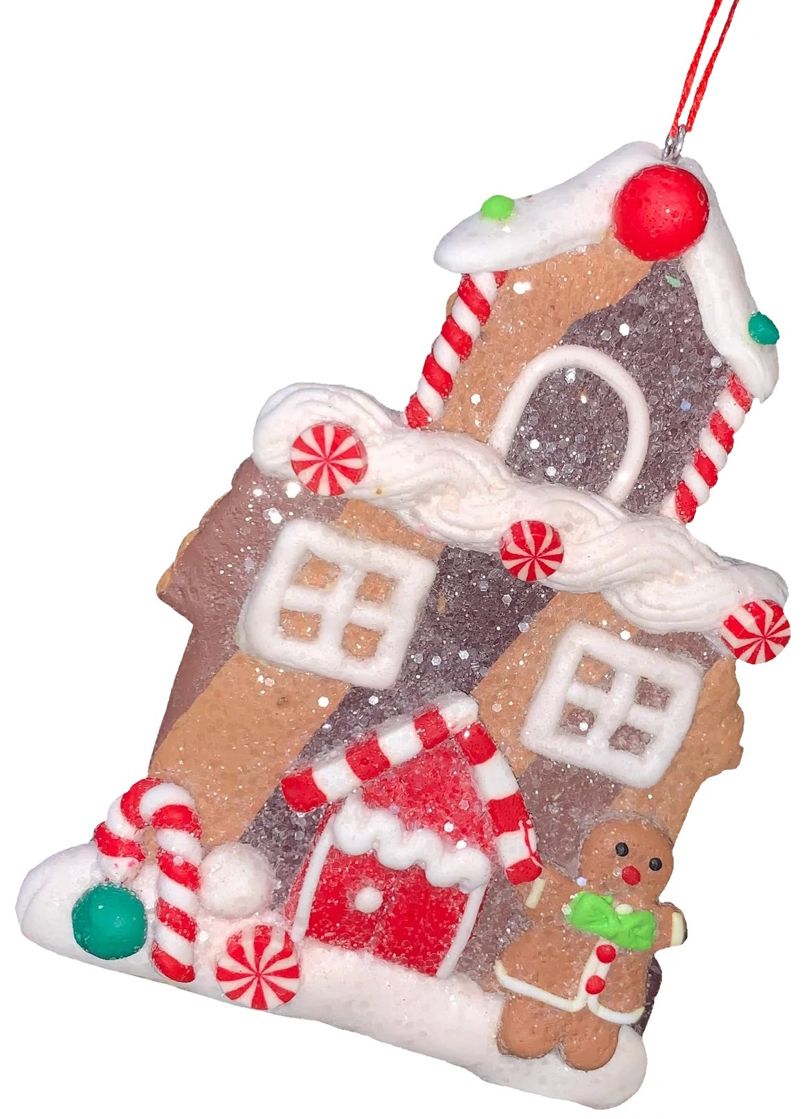 This ornament was designed to look like a gingerbread cookie house covered in sugar. This specific ornament has a tall steeple on the roof and features a candy cane on the left side of the front door and a gingerbread woman on the right side.