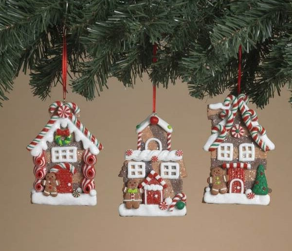 This is a lifestyle image showing the three different ornament options on a tree.