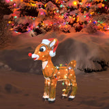 This is a lifestyle image showing the Rudolph sculpture out on a snowy lawn in front of some trees decorated for Christmas.