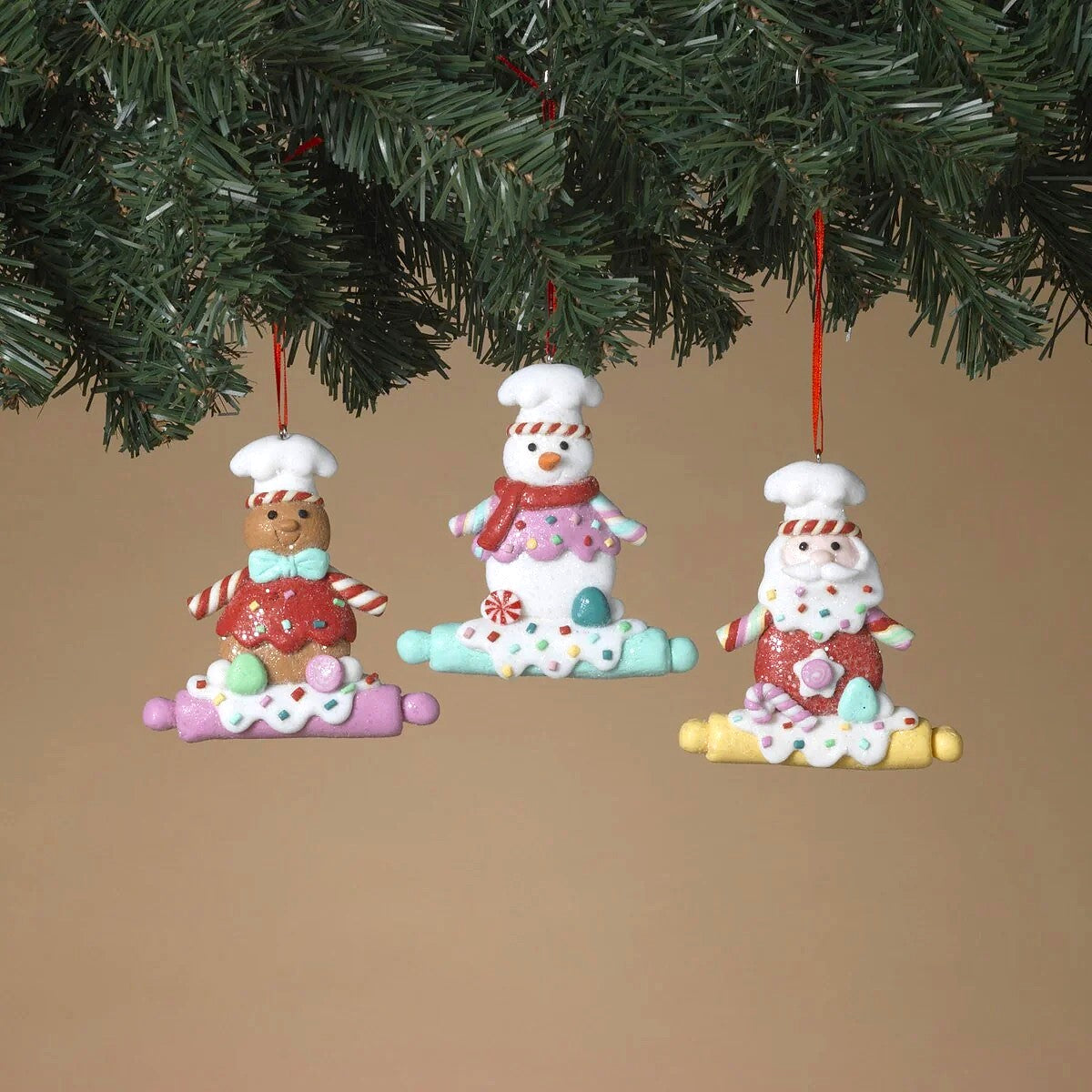 This is a lifestyle image showing the ornaments hanging from a tree.
