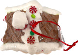 Ornaments shaped like gingerbread houses decorated with sugar, frosting, peppermint candies, gummy candies and candy canes.
