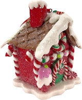Ornaments shaped like gingerbread houses decorated with sugar, frosting, peppermint candies, gummy candies and candy canes. This one has a cupcake and a peppermint candy accent.