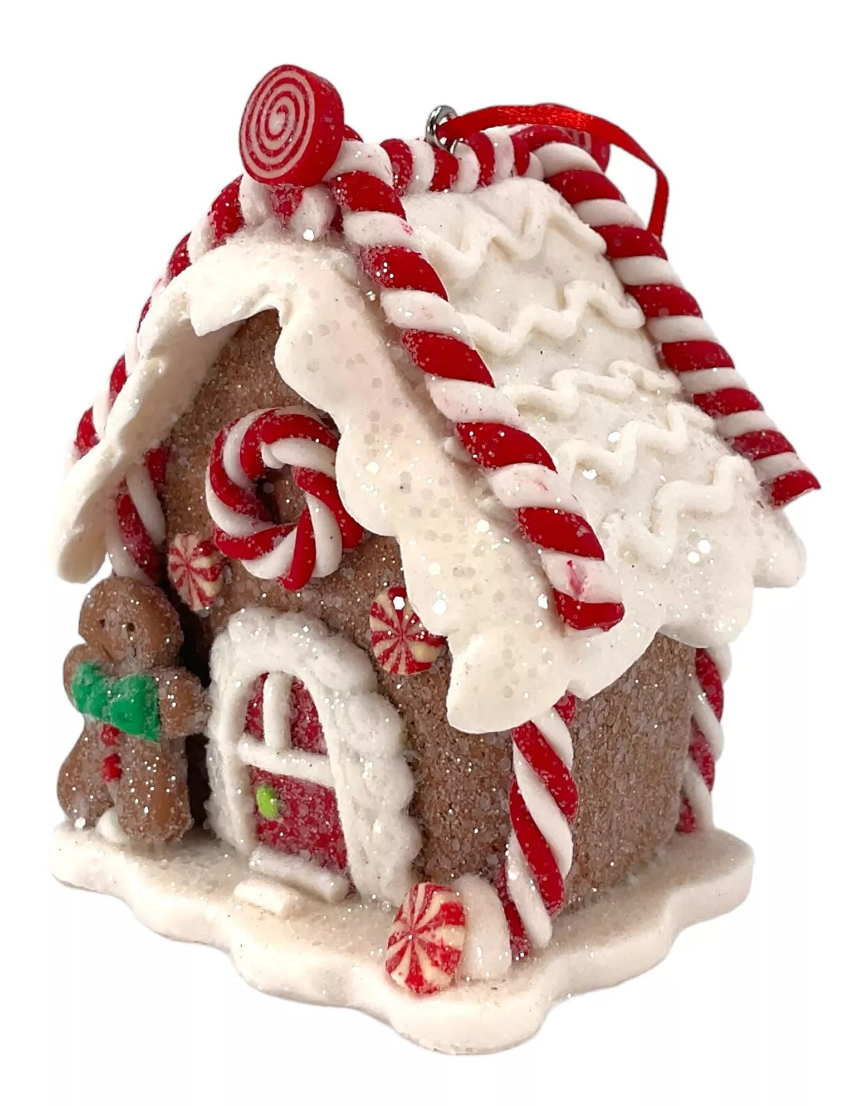Ornaments shaped like gingerbread houses decorated with sugar, frosting, peppermint candies, gummy candies and candy canes. This one has a gingerbread man and a peppermint candy accent.