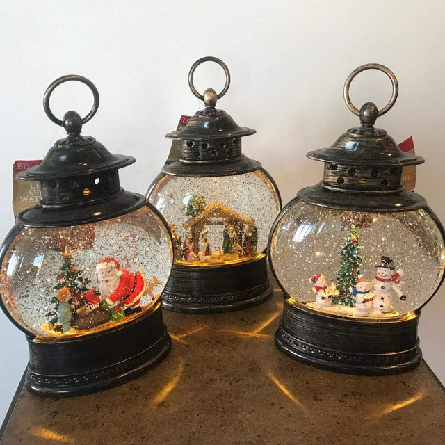 Glass globe lantern tabletop decoration. This picture shows the three options available.
