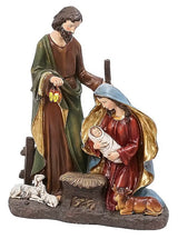 Lighted Nativity Scene featuring Mary, Joseph and Jesus surrounded by sleeping barn animals. Joseph is holding a lantern that lights up.