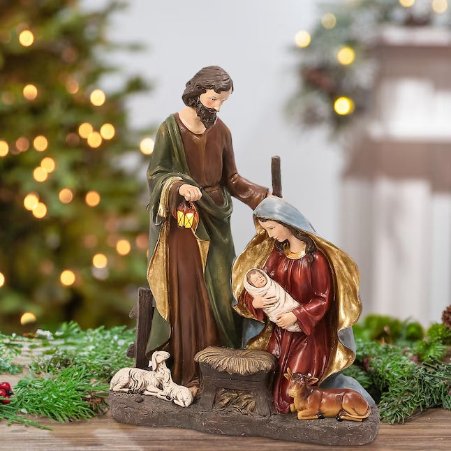 Lighted Nativity Scene featuring Mary, Joseph and Jesus surrounded by sleeping barn animals. Joseph is holding a lantern that lights up.