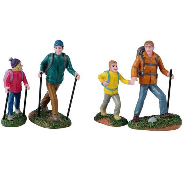 Resin figurines for a Lemax Village display. Designed to look like four people hiking.