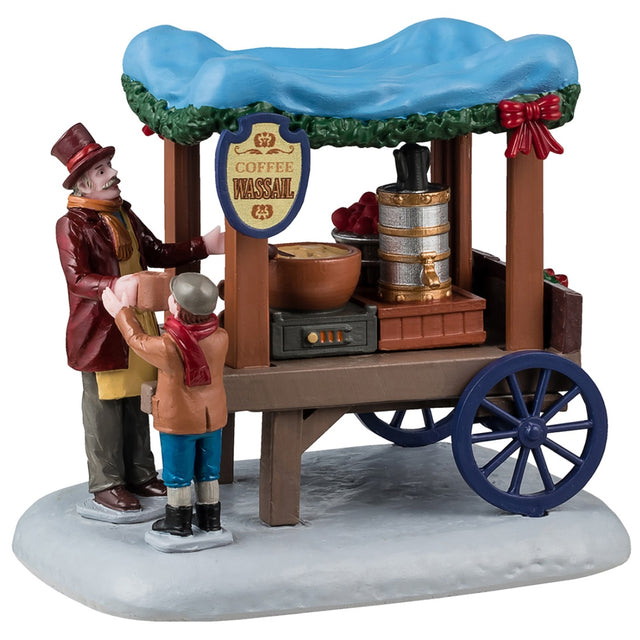 Resin table accent for a Lemax Village tabletop display. Designed to look like a wooden vendor cart. The sign reads "Coffee Wassail." The roof above the carriage is a light blue color and features a green garland around the edges. The vendor is wearing a marron jacket and top hat and is handing a cup to a young child wearing winter clothes. Inside the cart, there's a coffee maker and bowl of wassail warming over a heater.