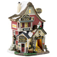 Porcelain lighted building for a Lemax display. Designed to look like a tall house with multiple signs on it. The signs read "Get your mining equipment: Picks, shovels & more!" "Lazy Gorge Gems & Gold Mine," "Sluice Box Pans & Boots," "Private No Entry," "Sitting on a gold mine since 1849," "Tour tickets inside," "Low beams; Watch your head" and "Mine Tours!"