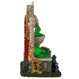 Resin village accent for a Lemax Spooky Town display. Designed to look like a well. The spout where the water is coming from is a skull with red eyes and bat wings. There are snakes and salamanders and a small skeleton man wearing a suit sitting at the bottom. The water is actually a bright green color.