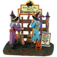 Resin table accent for a Lemax display. Designed to look like two witches storing their brooms at the broom rental spot. 