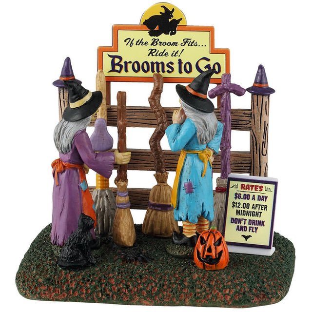 Resin table accent for a Lemax display. Designed to look like two witches storing their brooms at the broom rental spot. 
