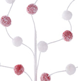 One white stem with five white branches coming off of it. On the branches, there are red and white, glitter covered pompoms on the branches.