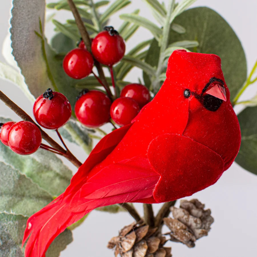 Pick spray decorated with flocked silk lamb's ear leaves, a plastic rosemary plant, plastic berries and pine cones.