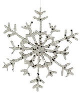 Ornament shaped like a snowflake covered in champagne glitter. There are two different styles.