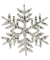 Ornament shaped like a snowflake covered in champagne glitter. There are two different styles.