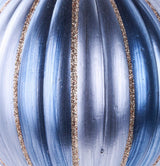 Round ornament with dark blue, light blue and gold glitter vertical stripes.