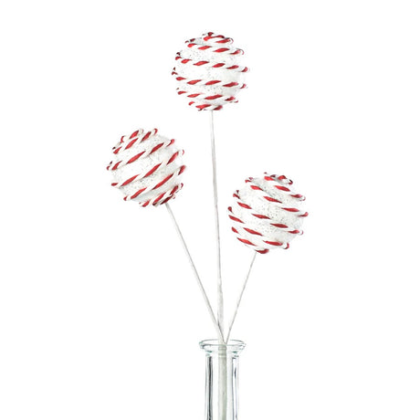 Pick spray with three white glitter balls with red and white stripes.