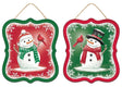 Winter ornament featuring a snowman smiling at a cardinal. One ornament has a green border and a red background. That snowman is wearing a red Santa hat and a green scarf. One ornament has a red border and a green background. That snowman is wearing a black top hat and a red scarf.