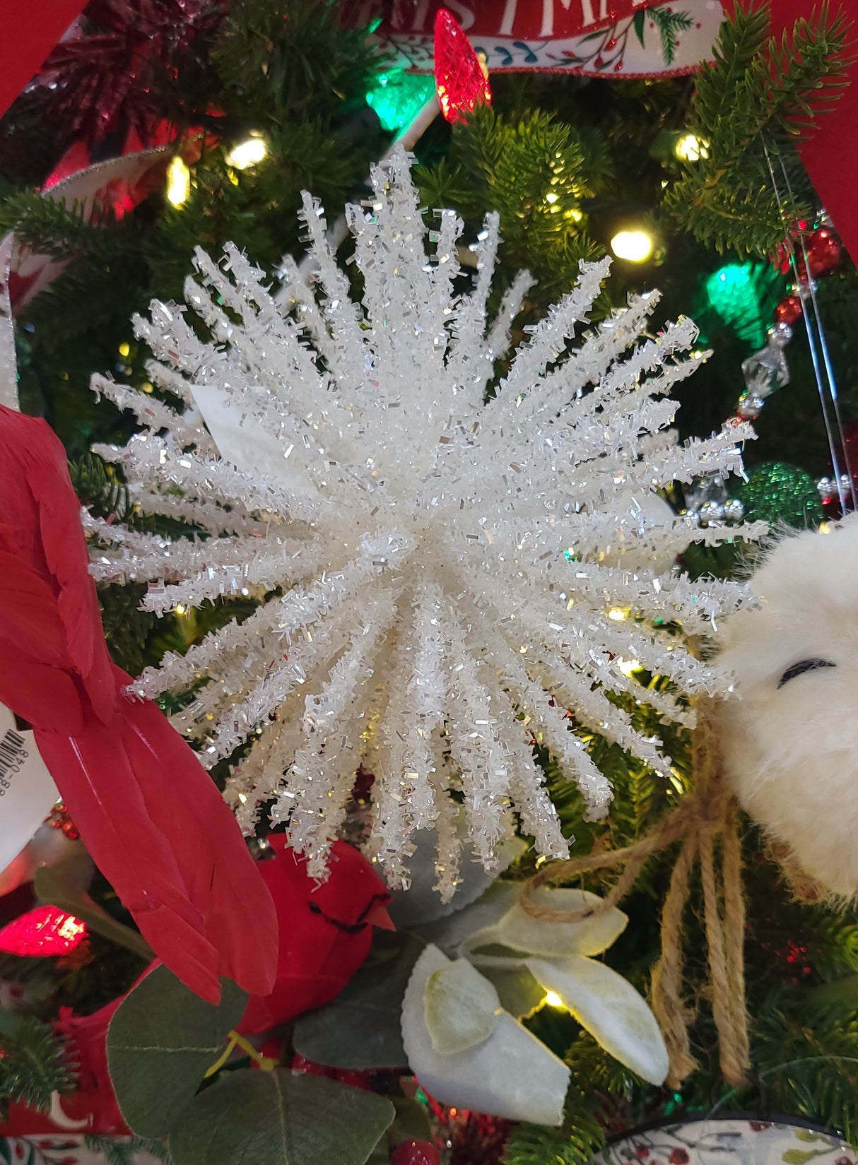 White tinsel starburst ornament.