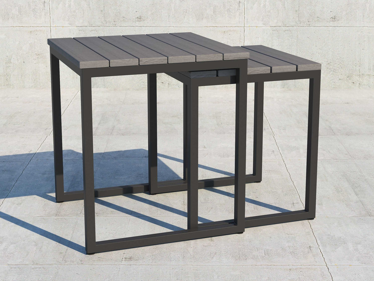 This image shows the nesting tables on a concrete patio.