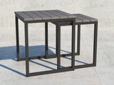This image shows the nesting tables on a concrete patio.