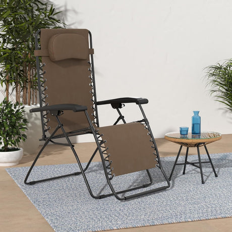 This image shows the brown colored Zero Gravity chair on a backyard patio.