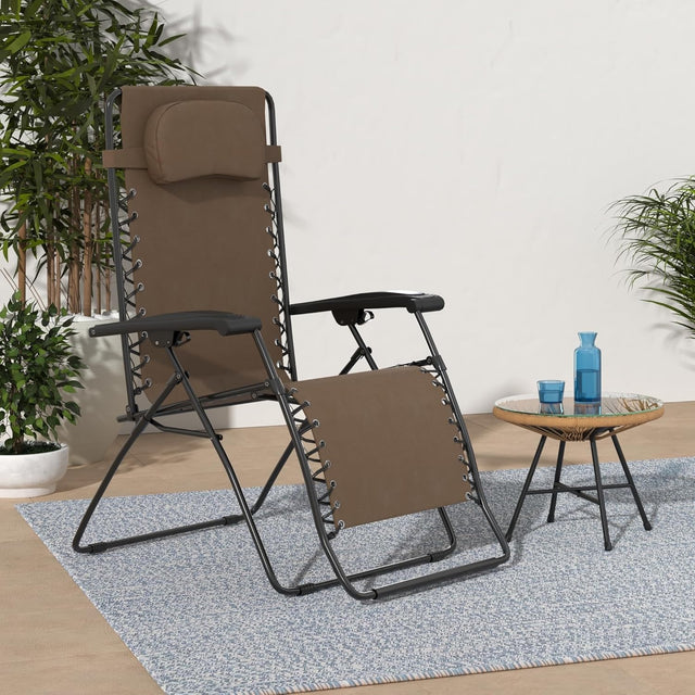 This image shows the brown colored Zero Gravity chair on a backyard patio.